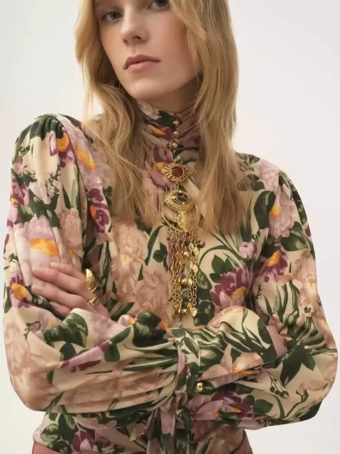 Buttoned mock-neck top in wool jersey