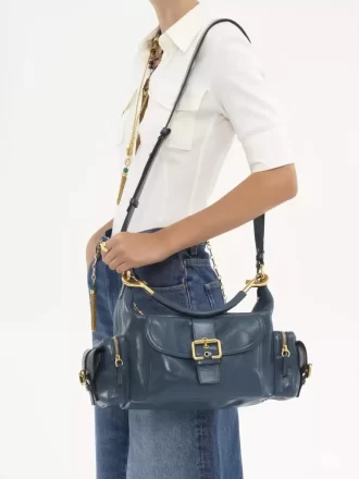 Camera bag in shiny leather