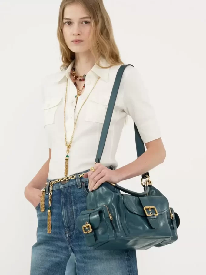 Camera bag in shiny leather