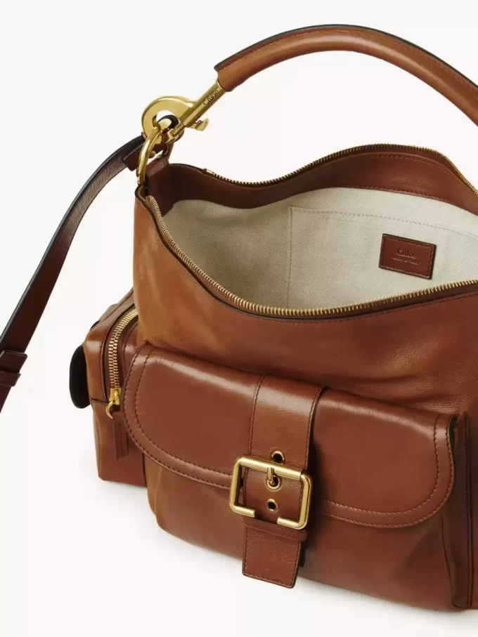 Camera bag in shiny leather