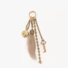 Chloé Symbols bag charm in brass & shearling