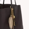 Chloé Symbols bag charm in brass & shearling