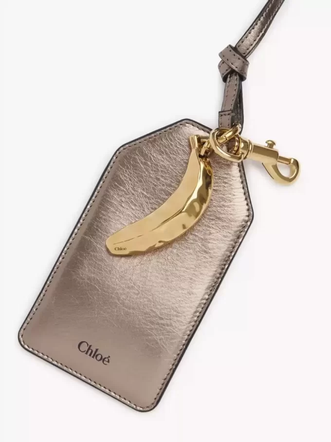 Chloé Symbols Banana tag in metallized leather