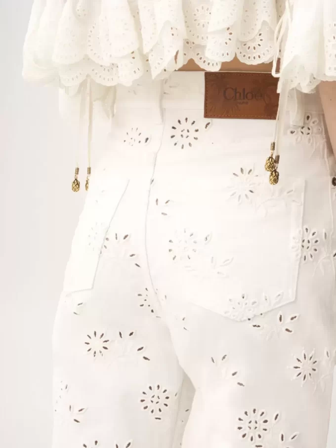 Embroidered cropped jeans in denim