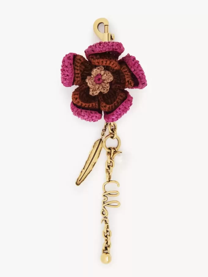 Flower bag charm in raffia & metal