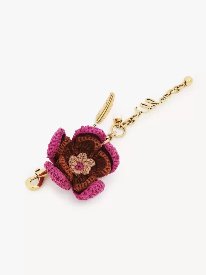 Flower bag charm in raffia & metal