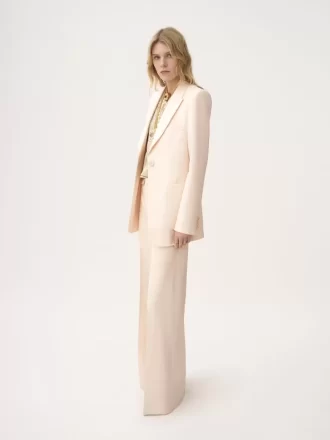 High-rise flared pants in wool gabardine