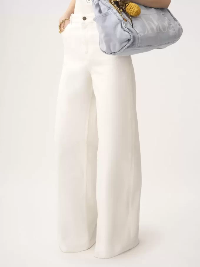 High-rise wide-leg jeans in denim