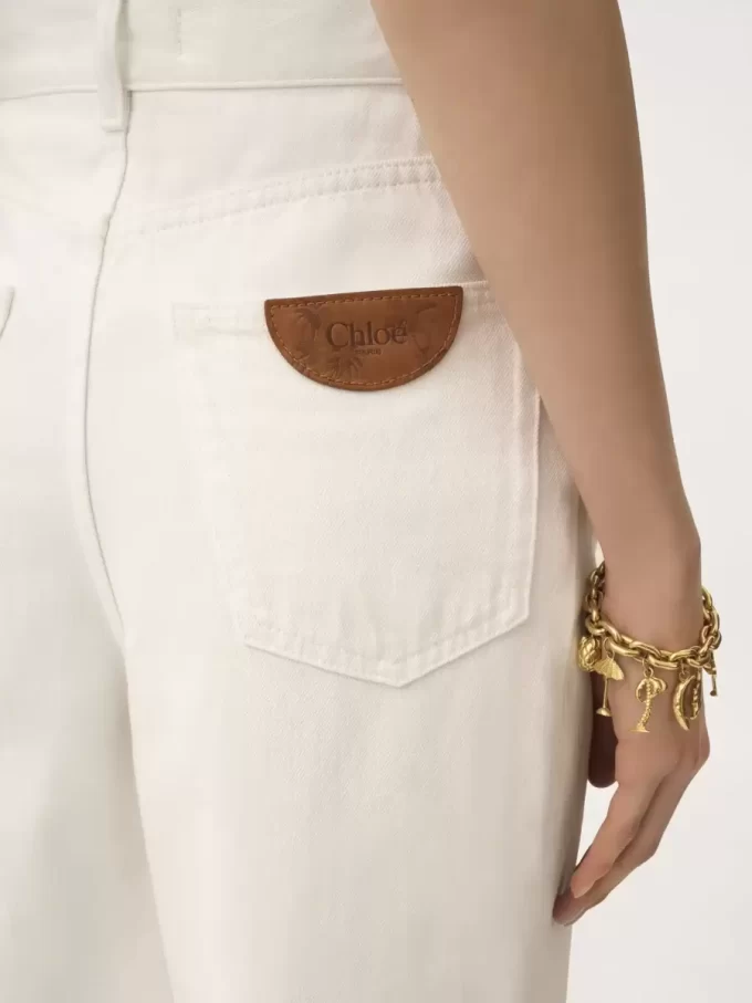 High-rise wide-leg jeans in denim