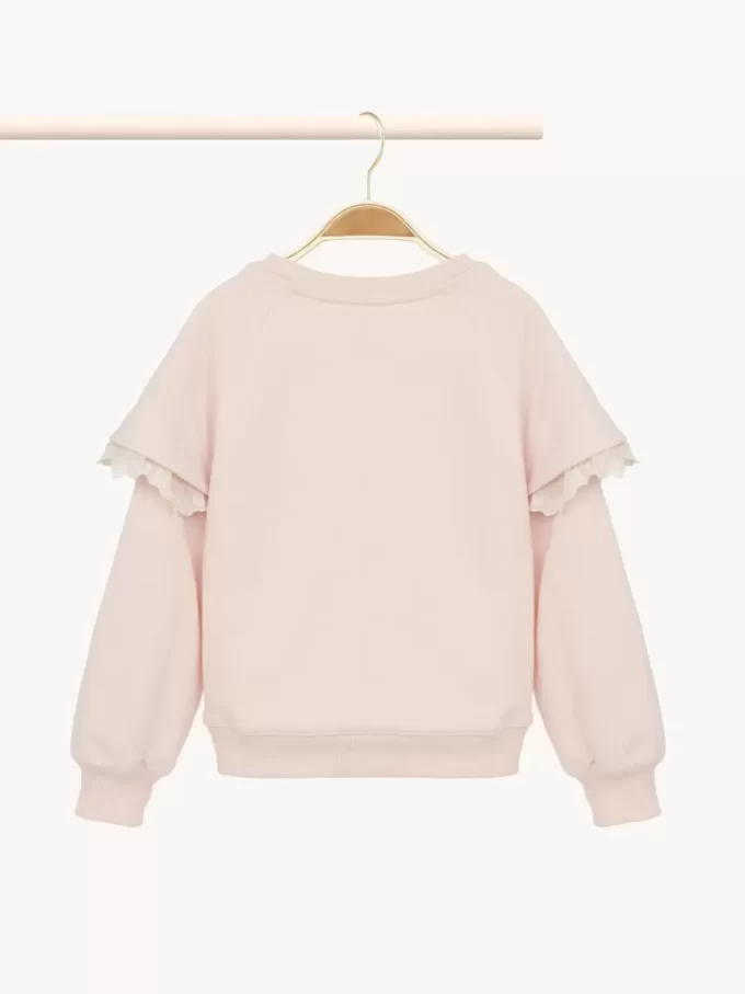 Kids’ ruffled sweater