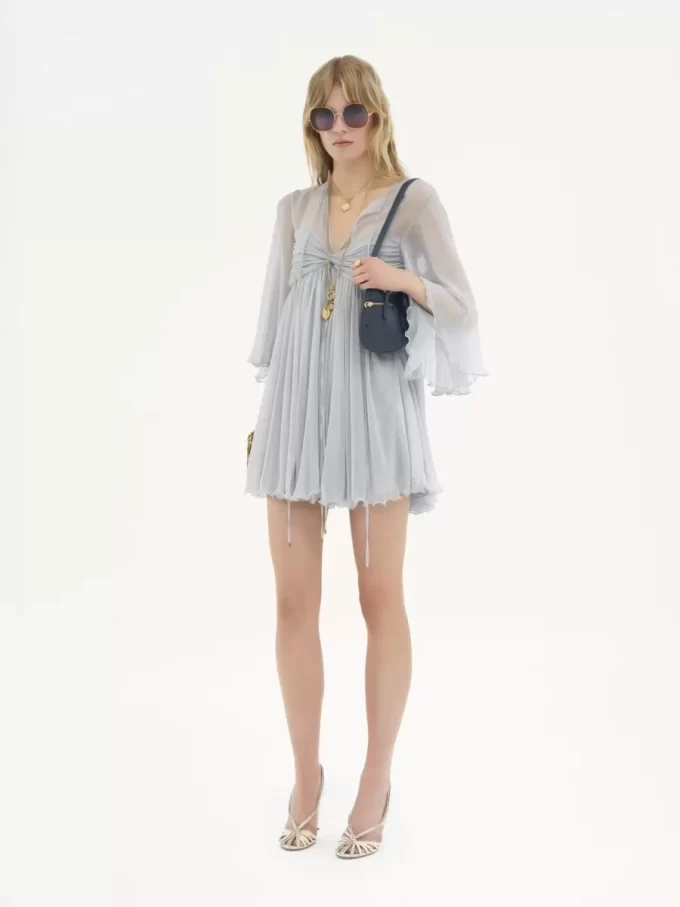 Pleated mini dress in silk mousseline