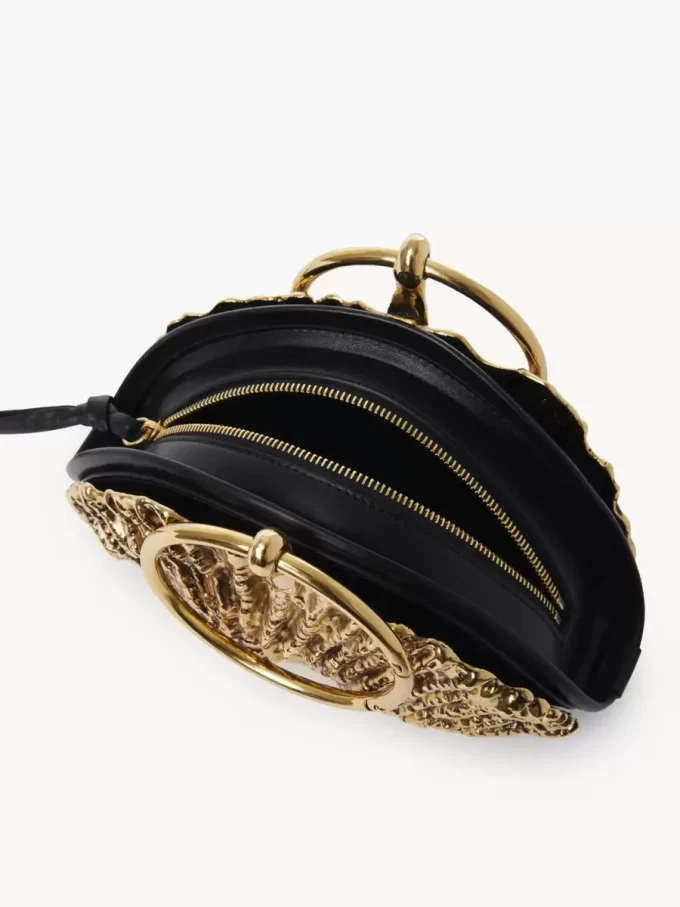 Sea Treasures Shell zipped clutch in soft leather & metal
