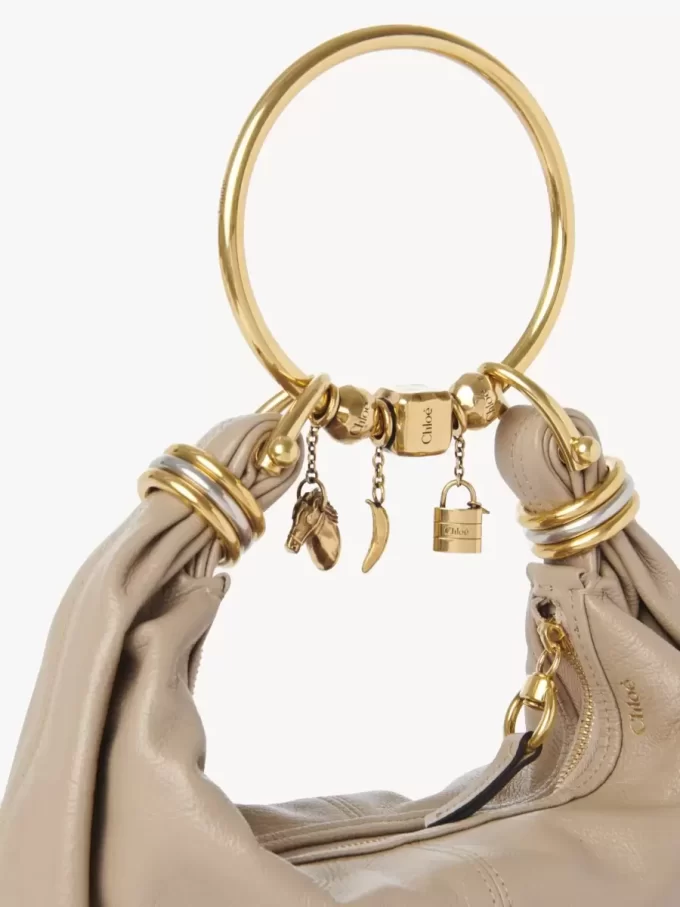 Small Bracelet Hobo bag in grained leather