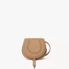Small Marcie saddle bag in grained leather