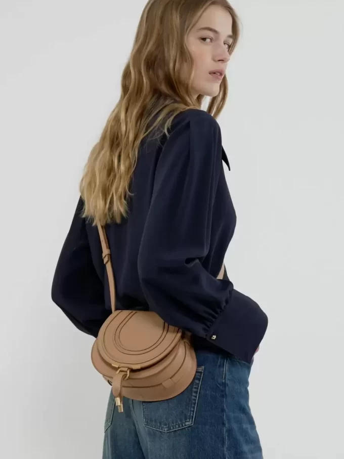 Small Marcie saddle bag in grained leather