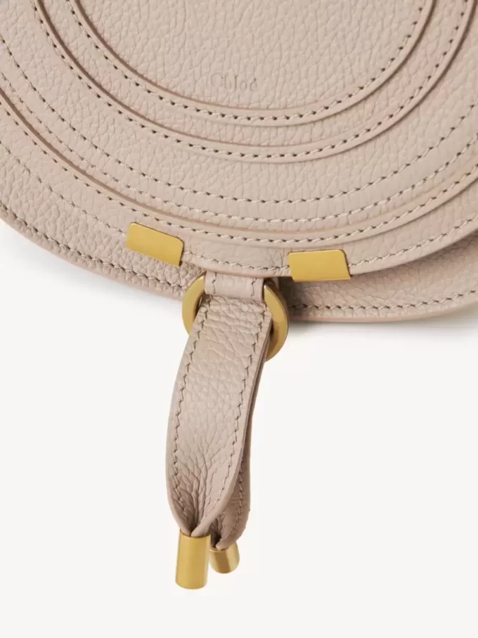 Small Marcie saddle bag in grained leather