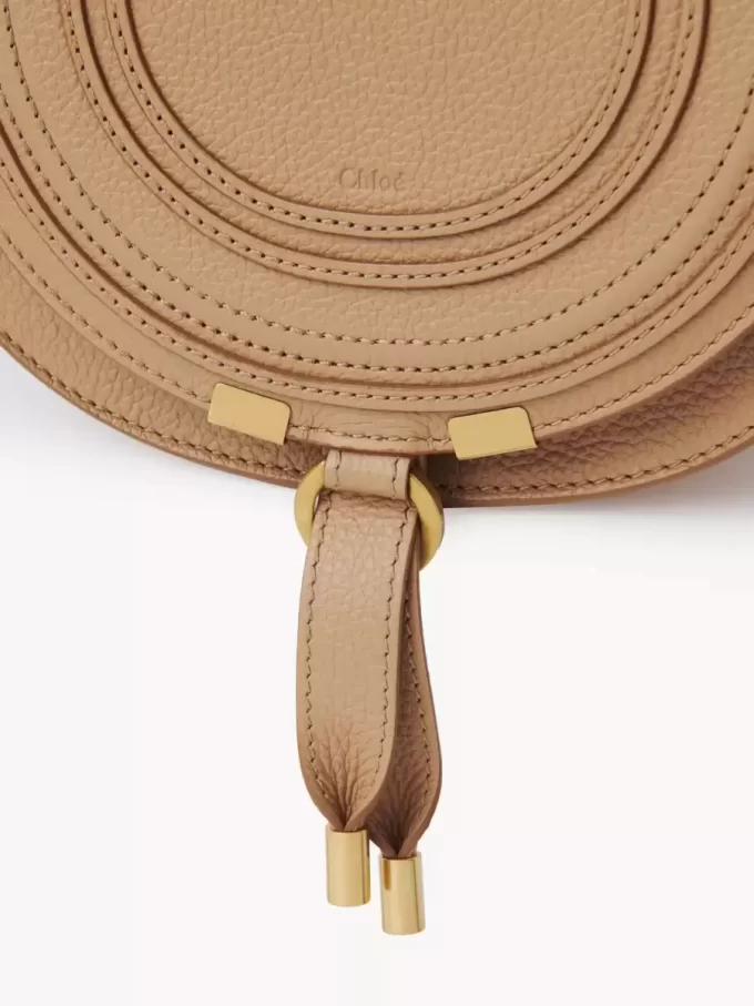 Small Marcie saddle bag in grained leather