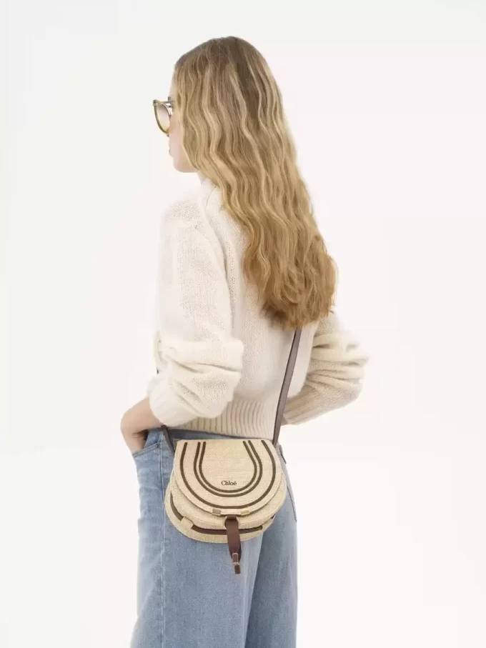 Small Marcie saddle bag in raffia-effect fibers