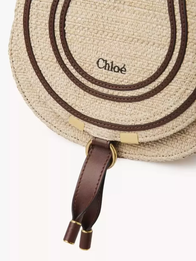 Small Marcie saddle bag in raffia-effect fibers