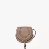 Small Marcie saddle bag in shiny leather