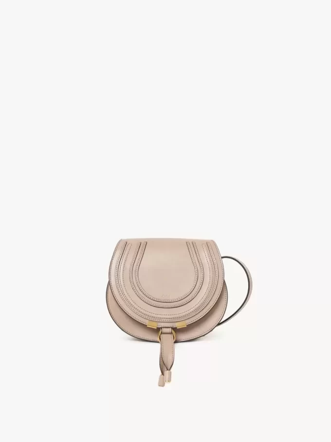 Small Marcie saddle bag in shiny leather