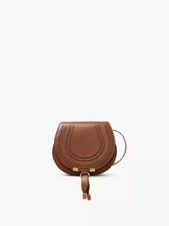 Small Marcie saddle bag in shiny leather