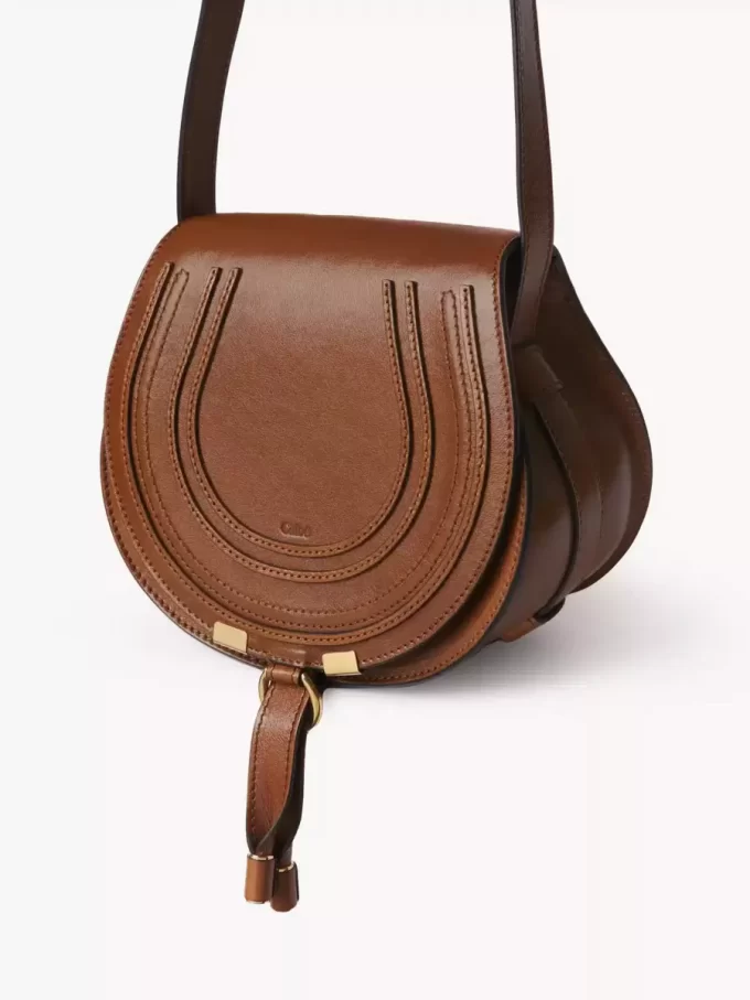 Small Marcie saddle bag in shiny leather