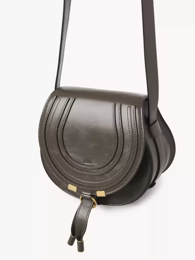 Small Marcie saddle bag in shiny leather