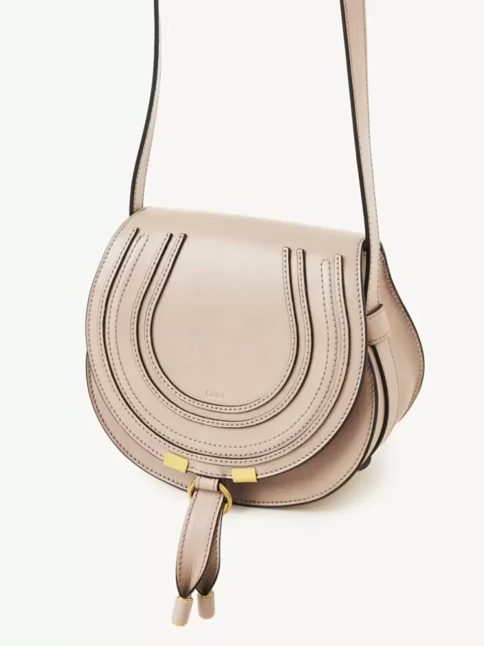 Small Marcie saddle bag in shiny leather
