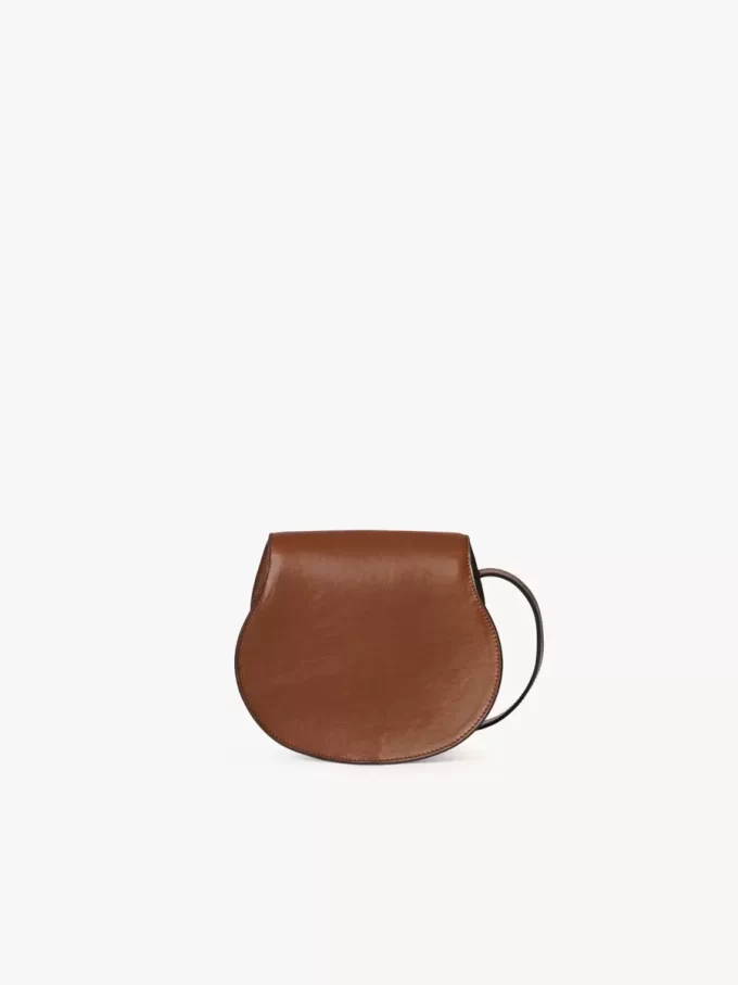 Small Marcie saddle bag in shiny leather