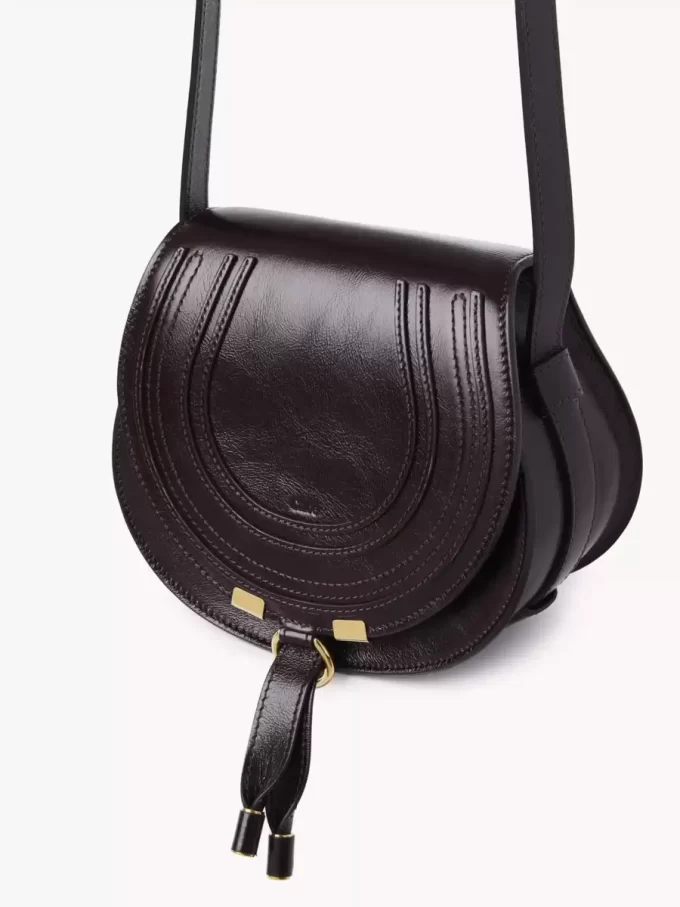 Small Marcie saddle bag in shiny leather