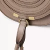 Small Marcie saddle bag in shiny leather
