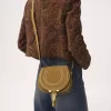 Small Marcie saddle bag in suede leather