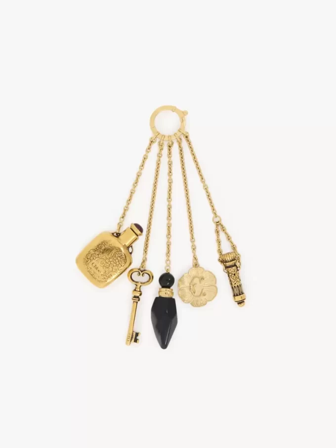 The Château Treasures charm in brass & resin