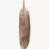 The Treasure Tails charm in shearling