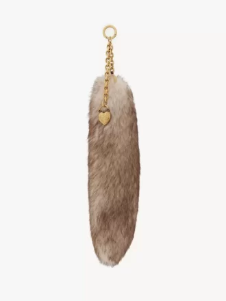 The Treasure Tails charm in shearling