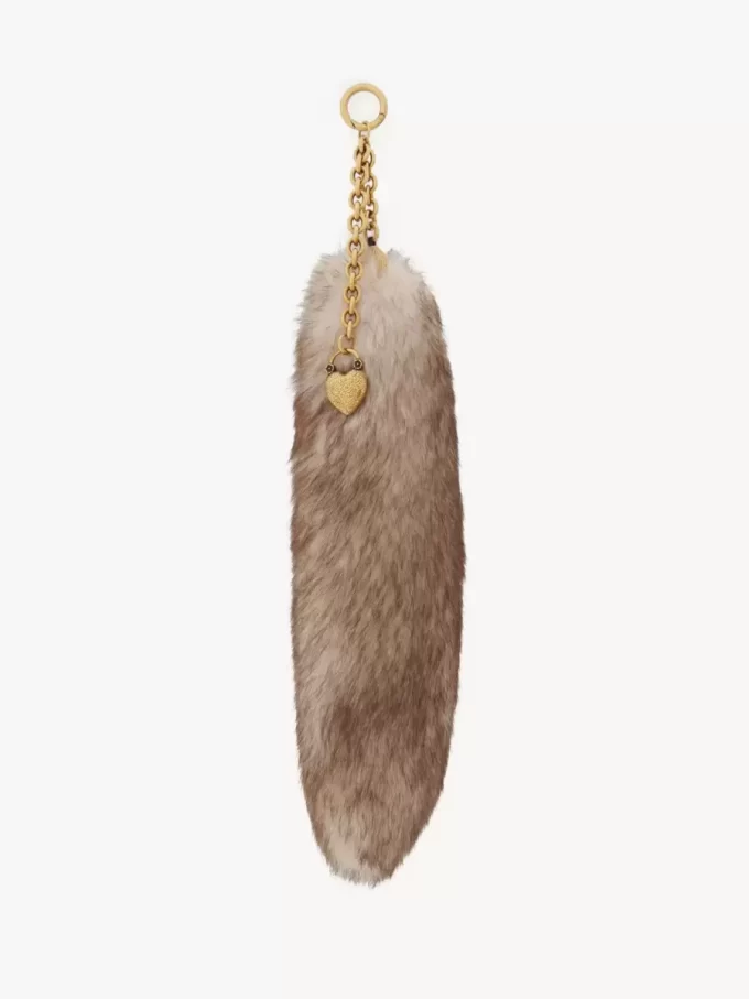 The Treasure Tails charm in shearling