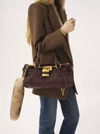 The Treasure Tails charm in shearling