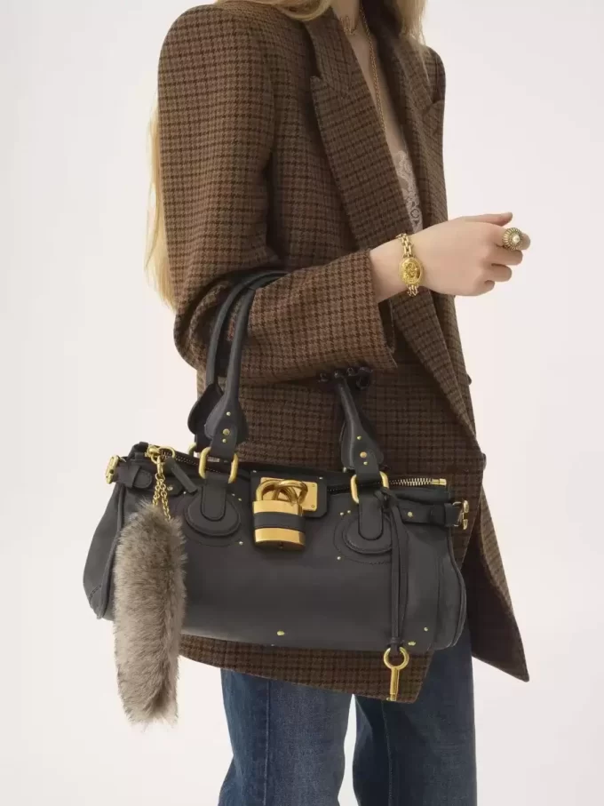 The Treasure Tails charm in shearling