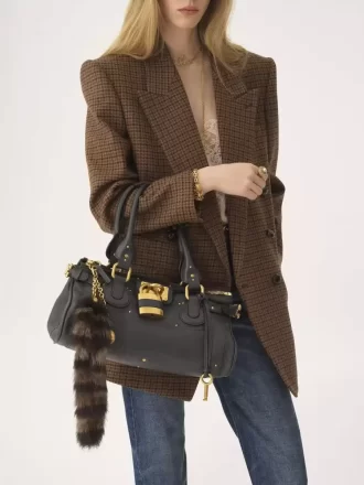 The Treasure Tails charm in shearling